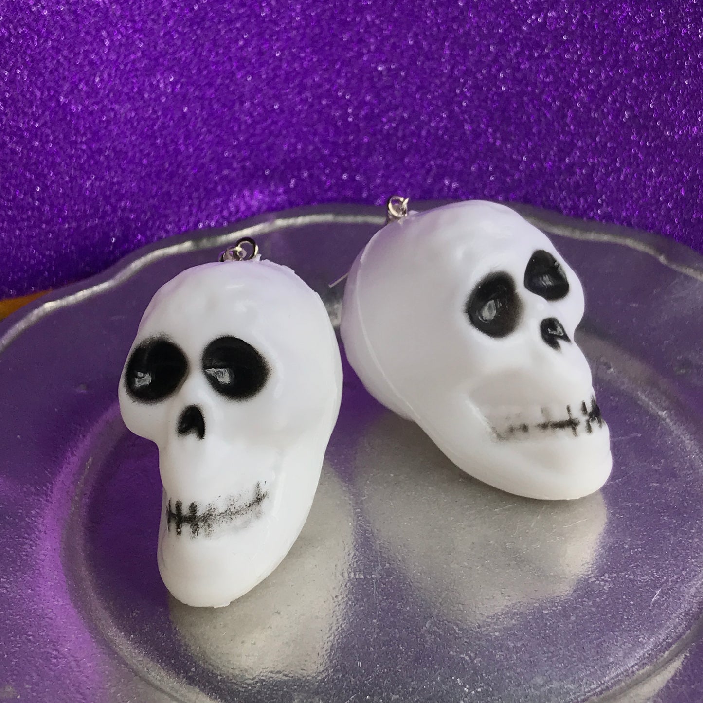 jack-o'-lantern and skull earrings