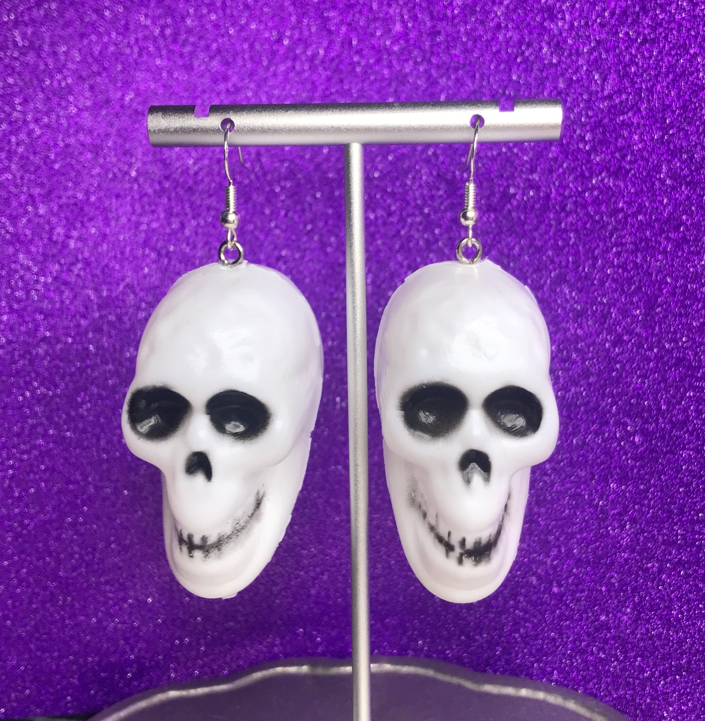 jack-o'-lantern and skull earrings