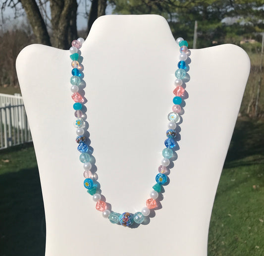 pink and blue pearly necklace