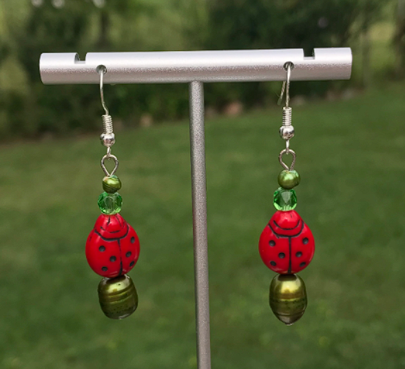 green mushroom/ladybug earrings